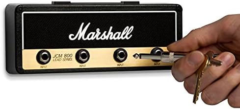 Оригиналният часова Marshall Jack Rack - Закачалка за ключове от китарен усилвател за стенен монтаж. Включва в себе си 4 ключодържател за китара штекеров и 1 комплект за стен