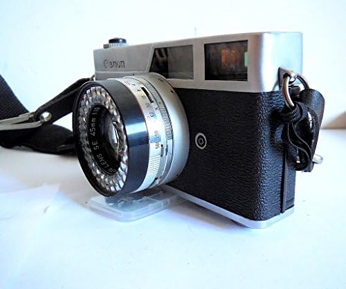 Bell & Howell Canon Канонирует Първо Оригиналната фолио фотоапарат 1961 година Electric Eye, Капак на обектива,